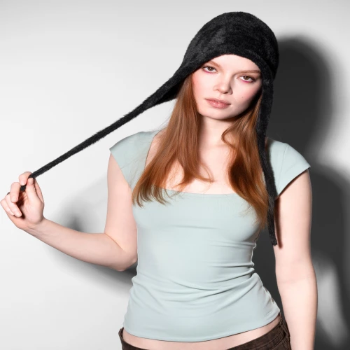 Side view of Kangol Hat Faux Fur Knit Bonnet highlighting ear coverage