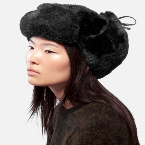 Side view of Kangol Hat Faux Fur Trapper showing ear flap design