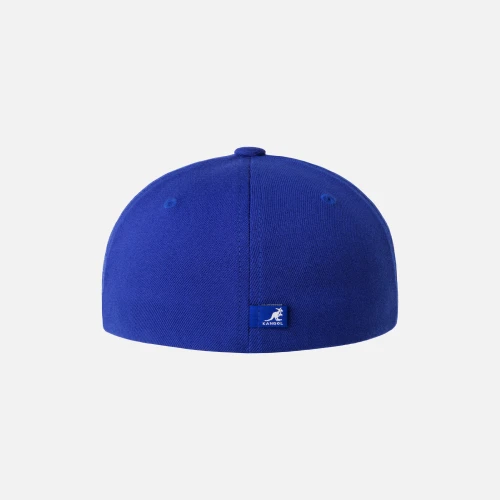 Side view of model wearing Kangol Hat Wool FlexFit Baseball Cap